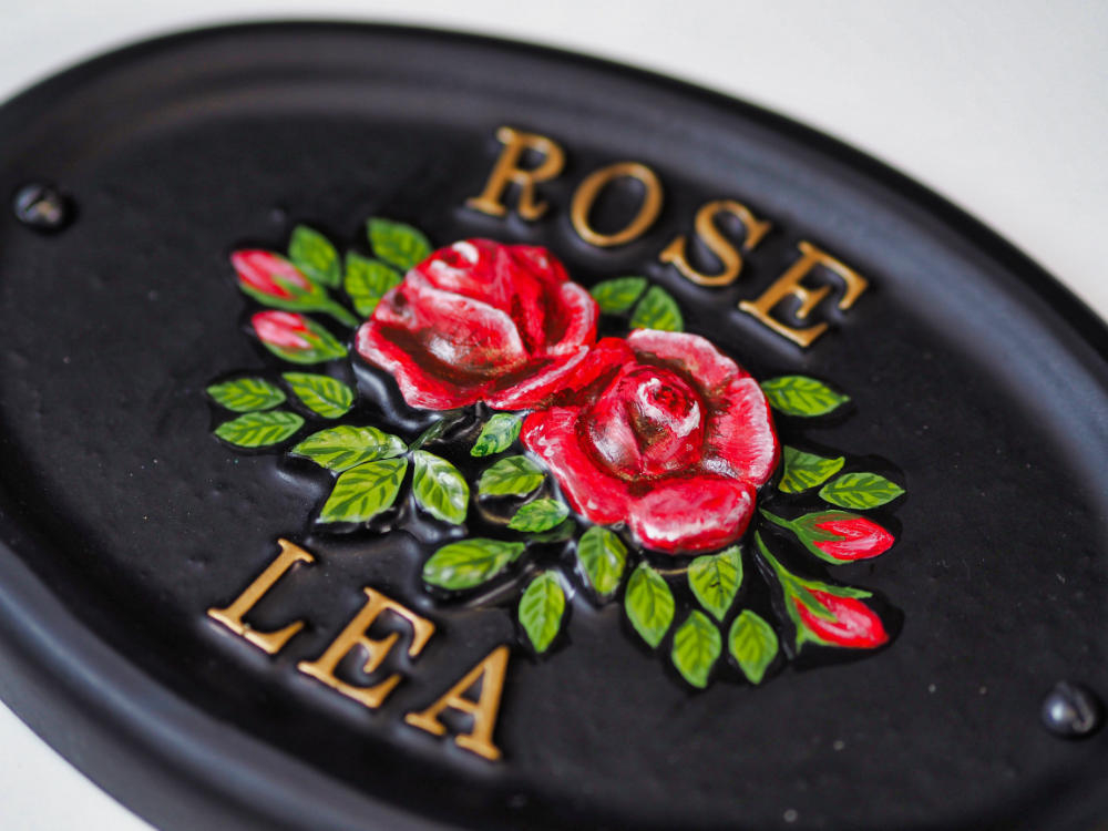 Roses close-up. house sign
