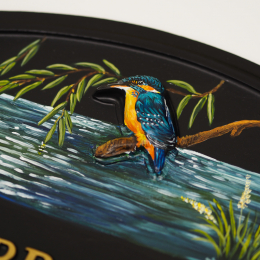 Kingfisher close-up. house sign