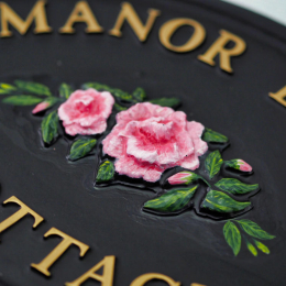 Camellia close-up. house sign