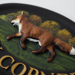 Fox Walking close-up. house sign