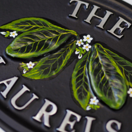 Laurel Leaves close-up. house sign