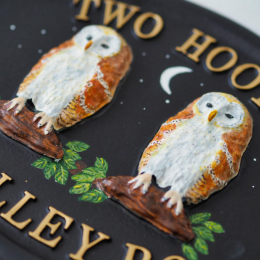 Owls Barn close-up. house sign