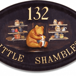 Pooh Bear Sitting house sign