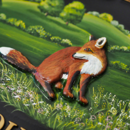 Fox Sitting close-up. house sign