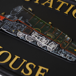 Train close-up. house sign