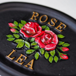 Roses close-up. house sign