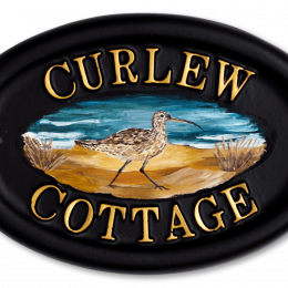 Curlew Flat Painted house sign